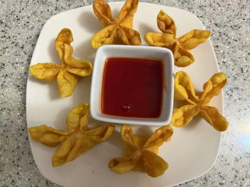 Fried crab rangoon with sweet chili sauce at China Dragon, a Chinese Restaurant in Orange Beach