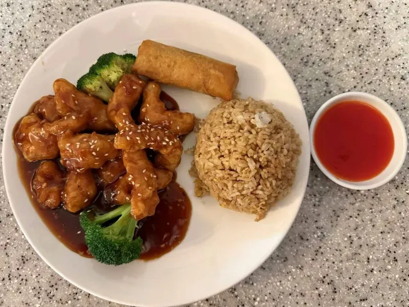 Lunch combo: sesame chicken, fried rice, egg roll at China Dragon, a Chinese Restaurant in Orange Beach