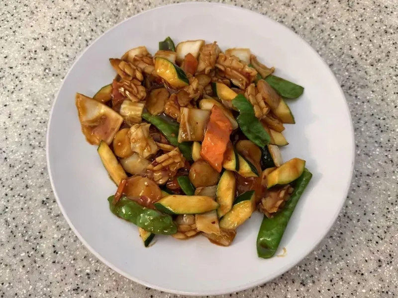 Stir-fried squid with veggies in savory sauce at China Dragon, a Chinese Restaurant in Orange Beach